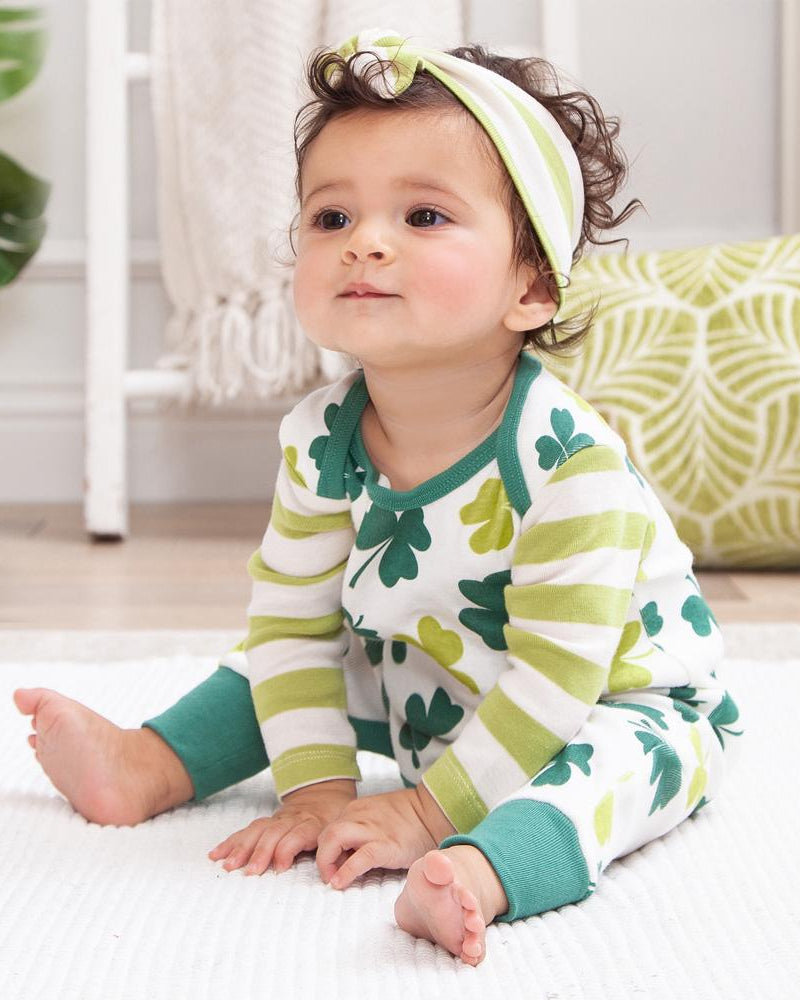 Baby shamrock romper with long sleeves and green-and-lemon striped cuffs