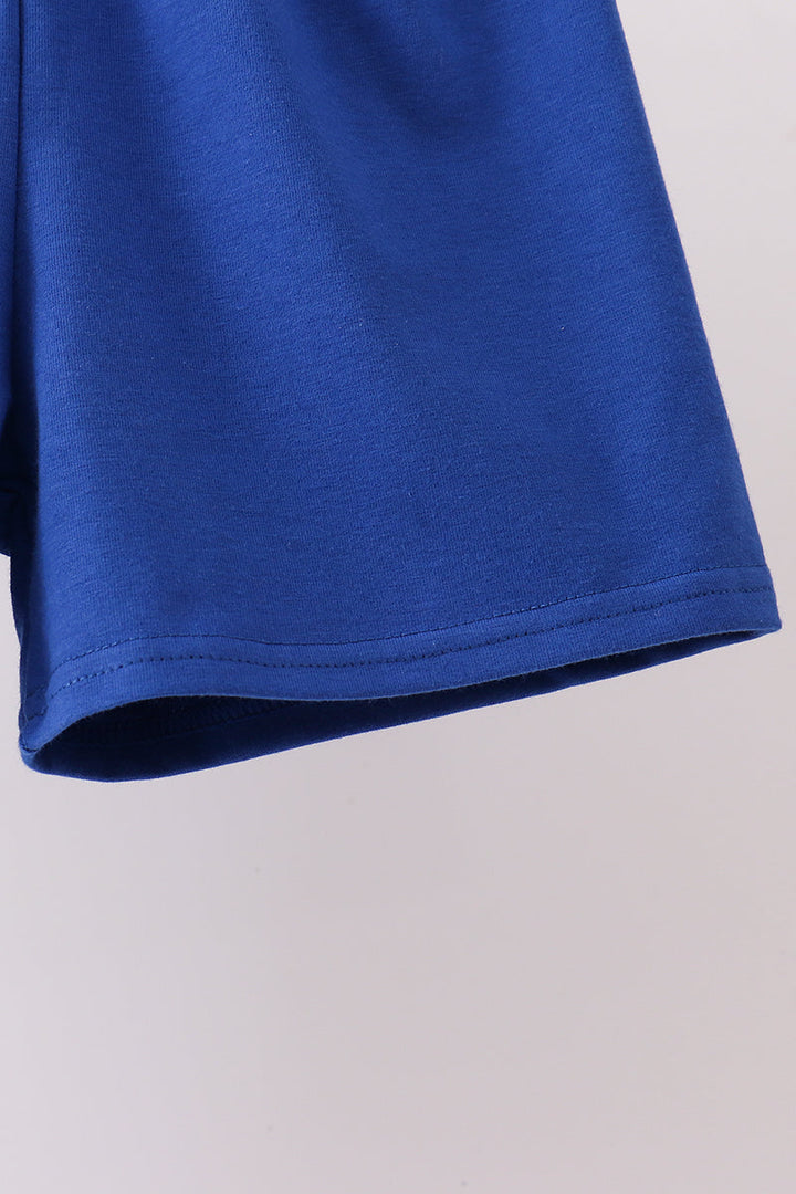 Close-up of a blue fabric on a light gray background