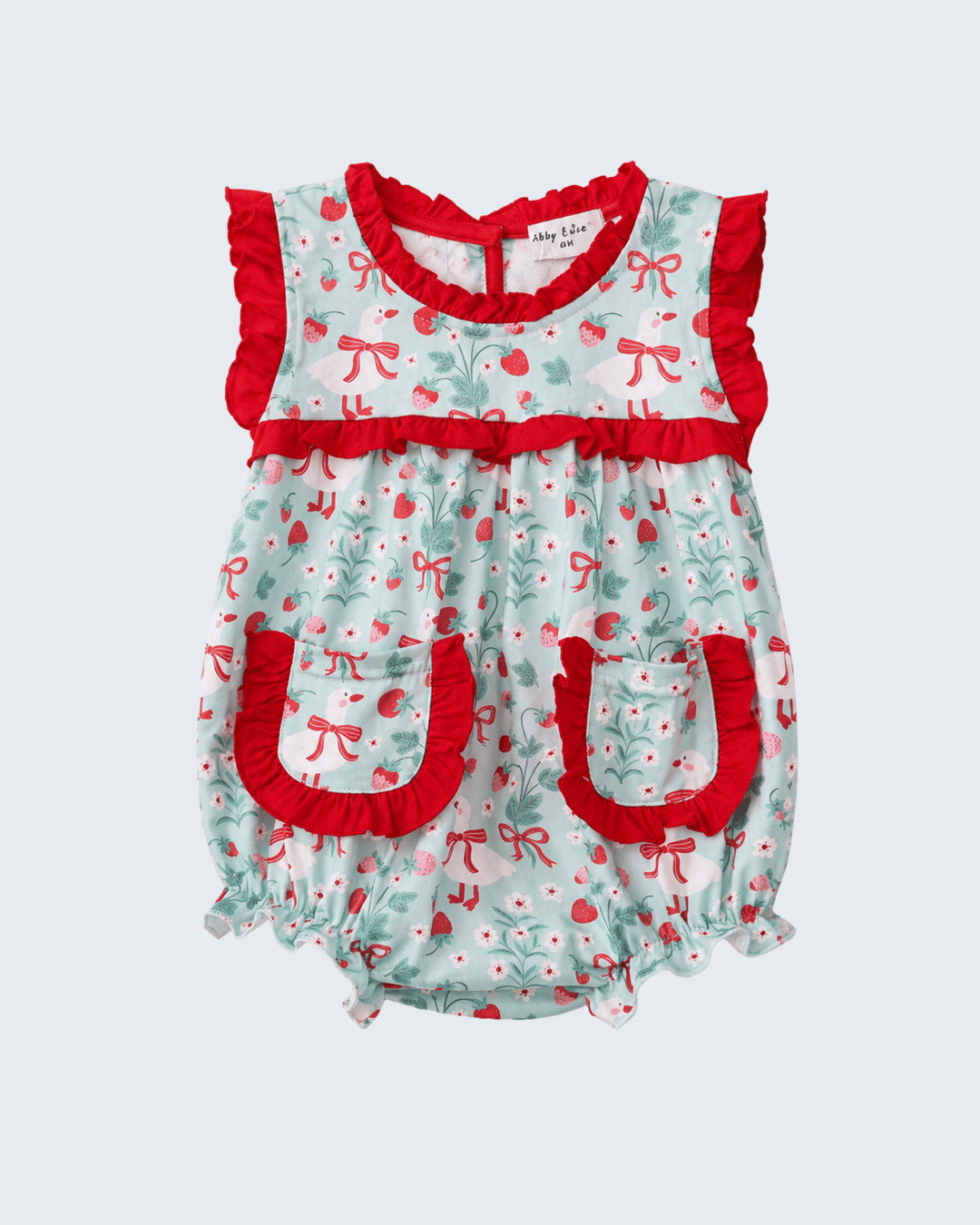 Baby romper with red and white pattern on a light gray background