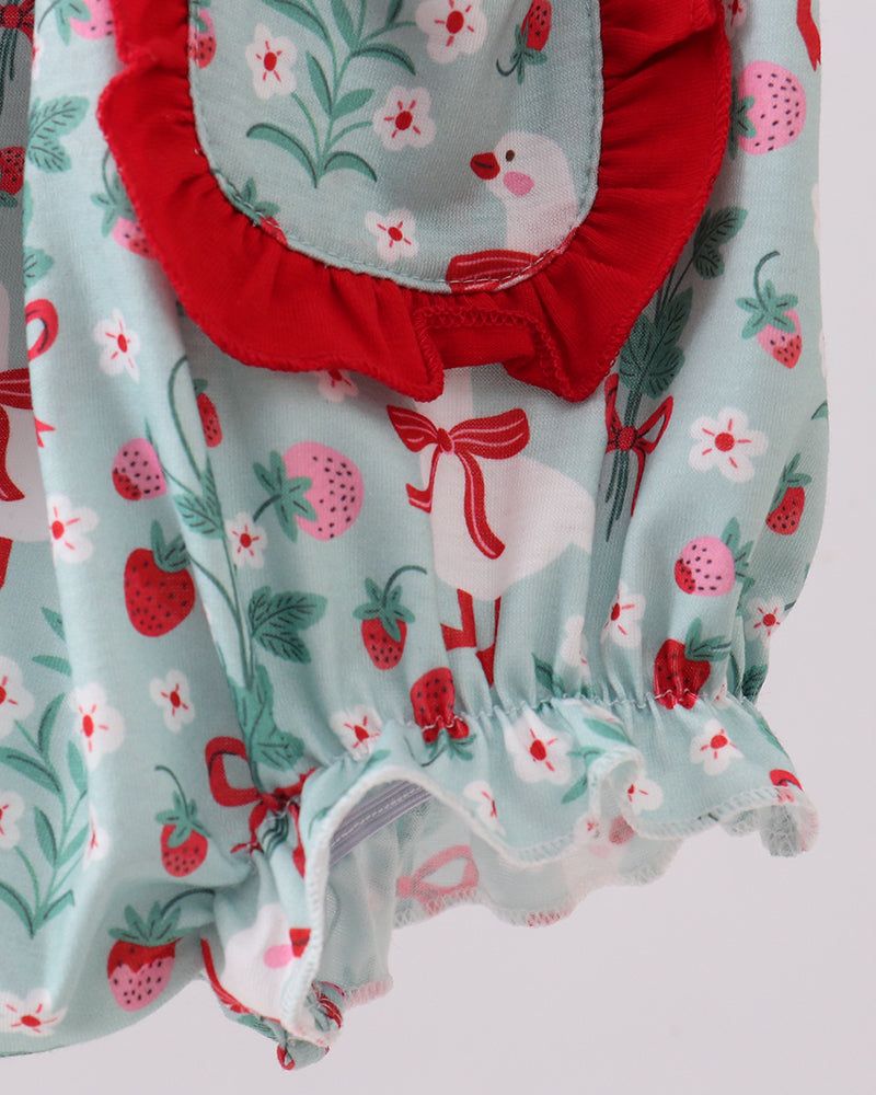 Baby romper with red and green floral pattern on a white background