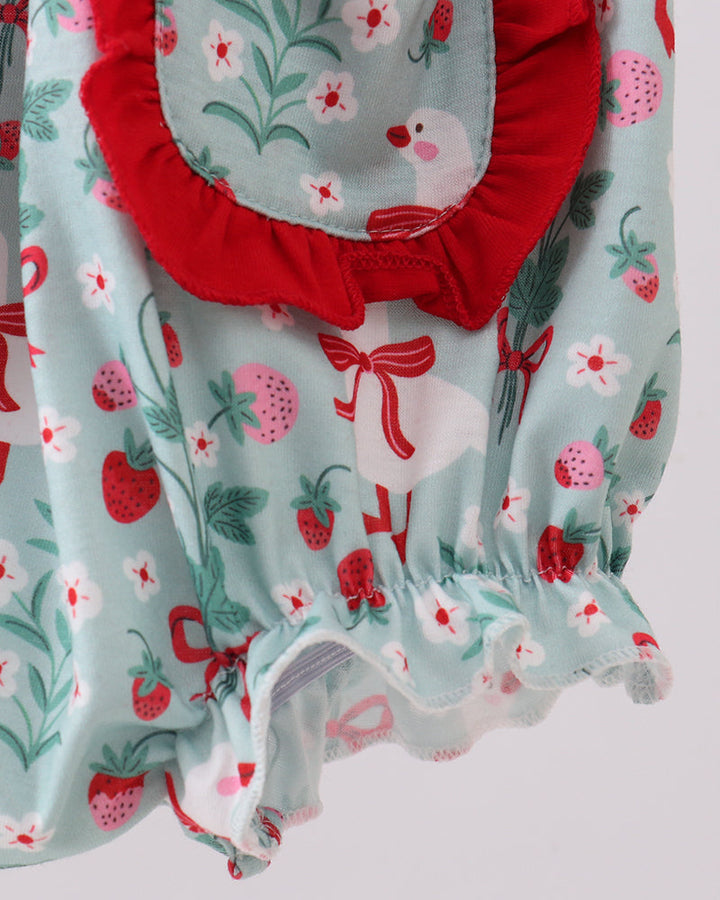 Baby romper with red and green floral pattern on a white background