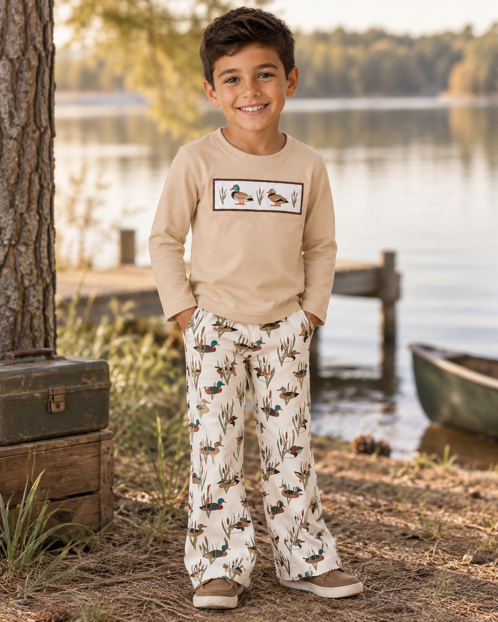 Kids duck-print pajama set with tan long-sleeve top and matching pants