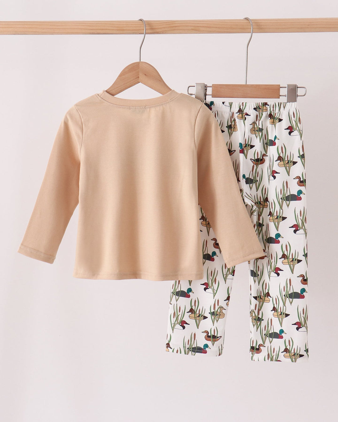 Tan long-sleeve shirt and matching pajama pants set with duck print