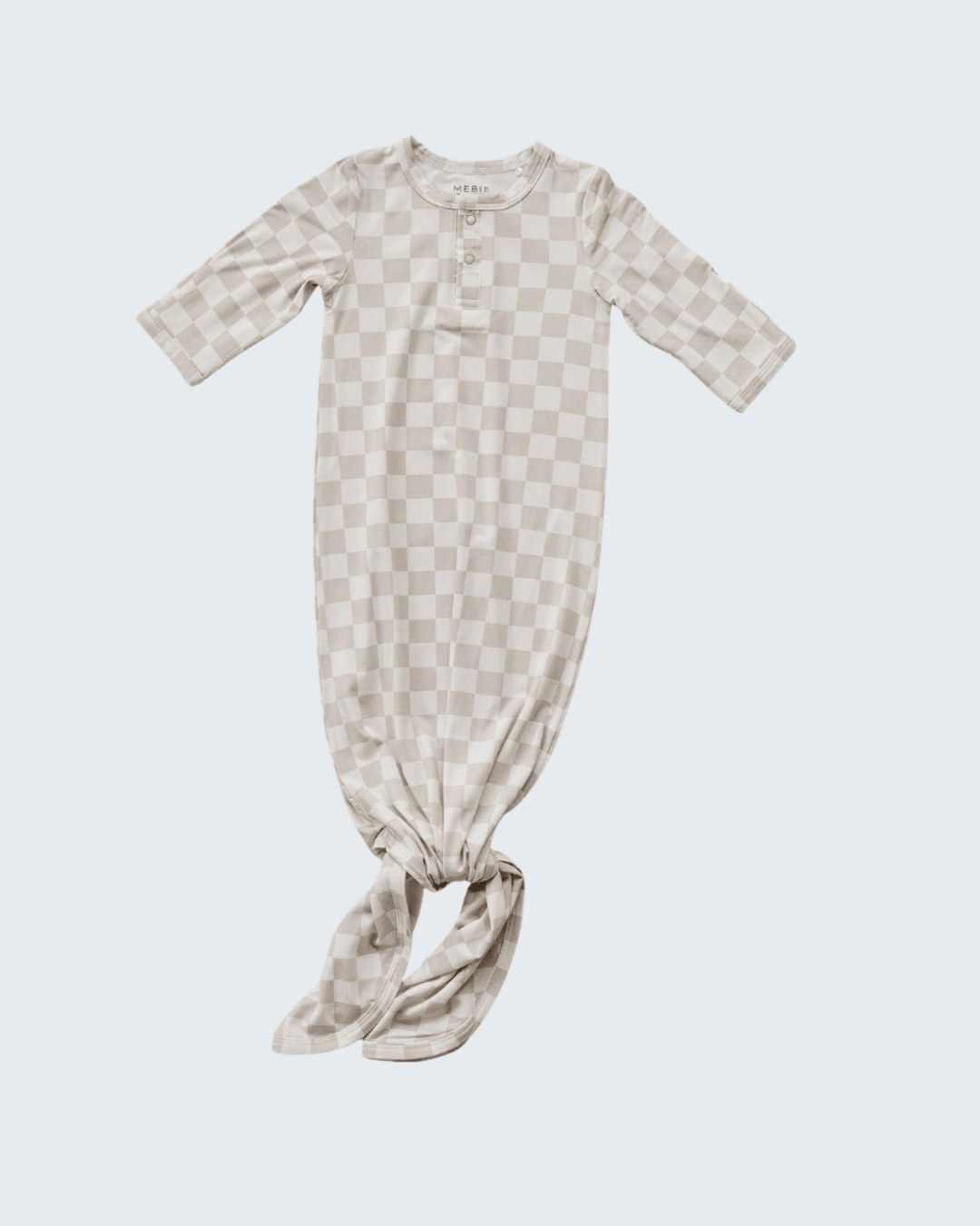 Checkered baby onesie on a white background