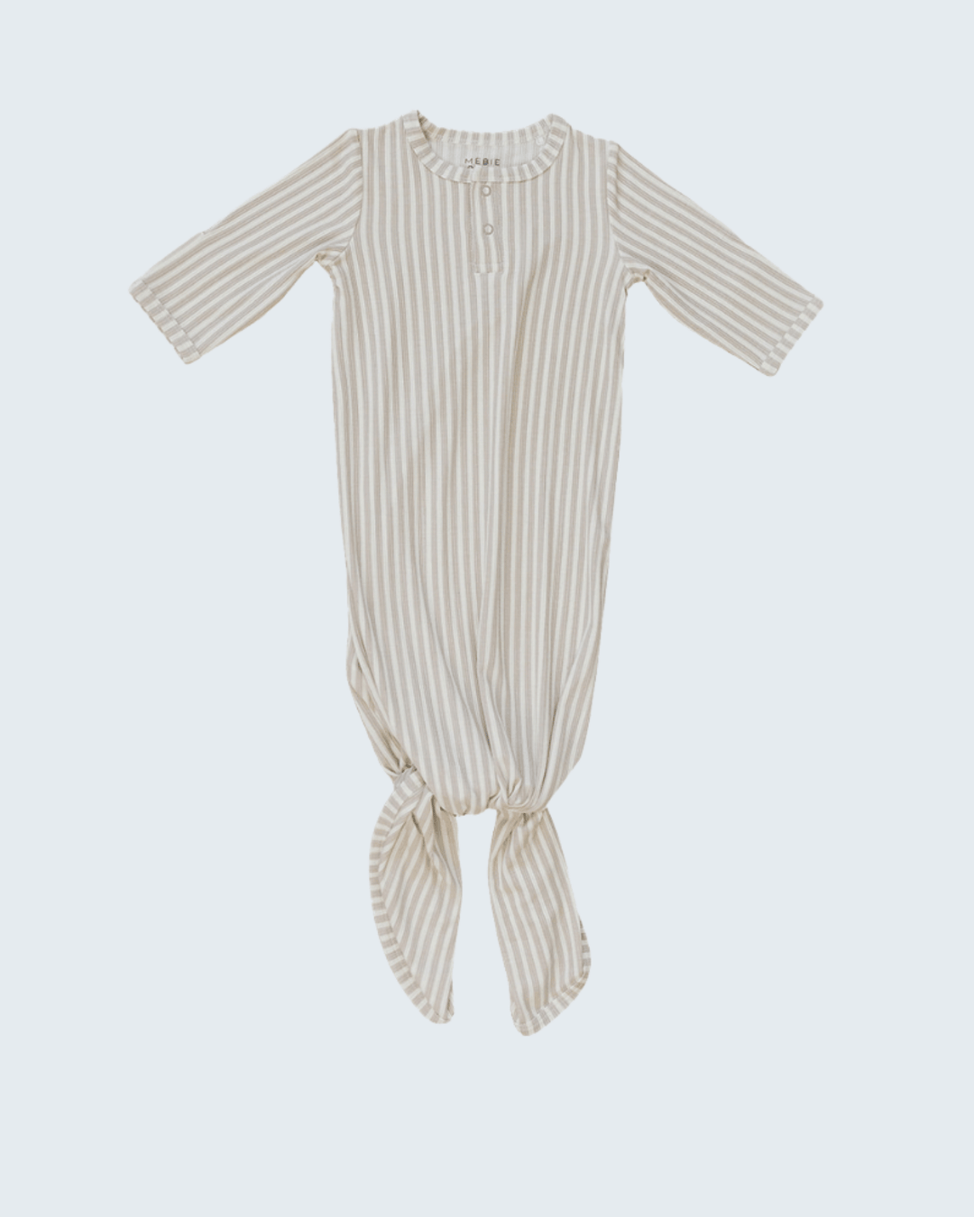Striped baby gown on a light gray background