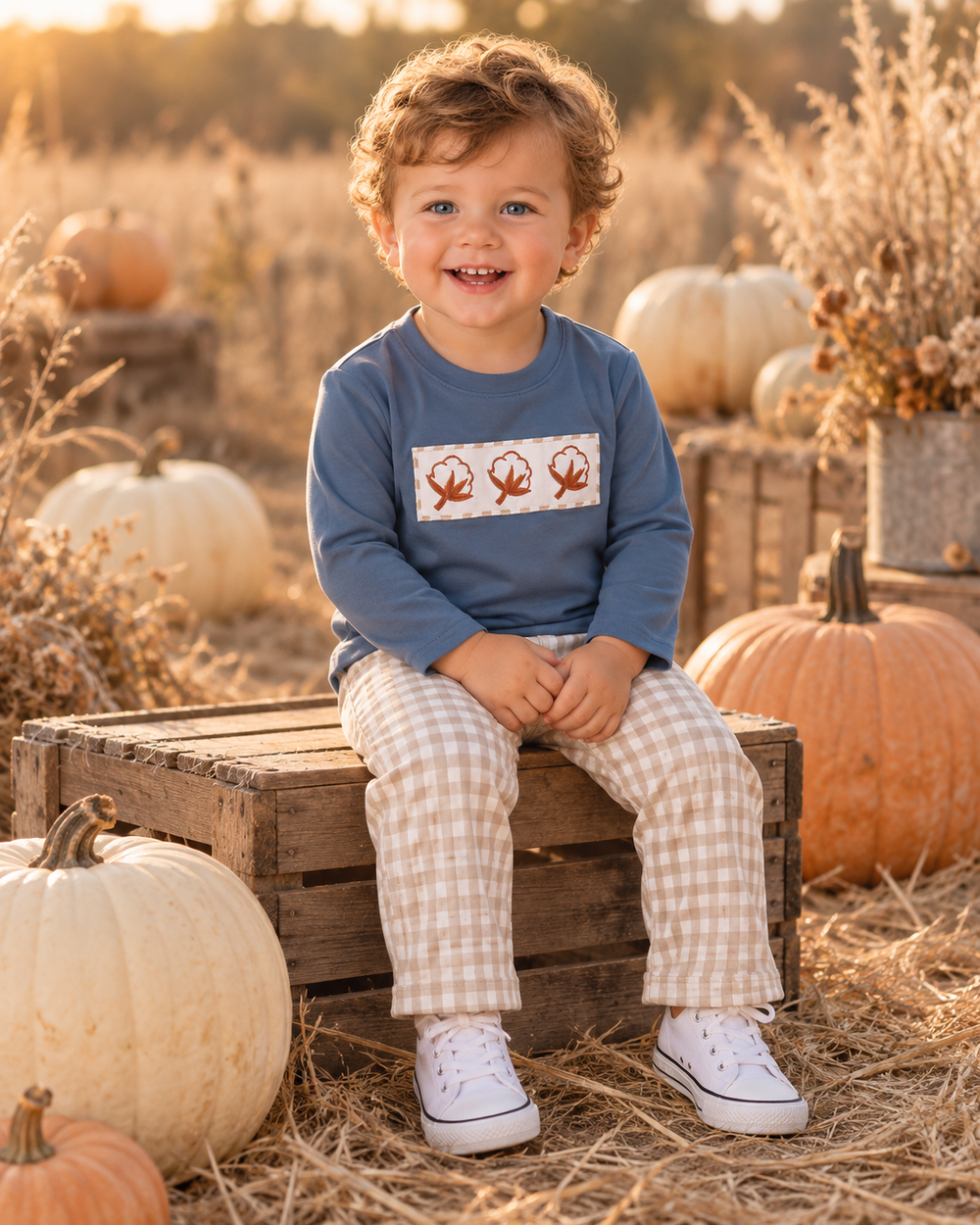 Kids set on model: teal top with embroidered panel and gingham pants
