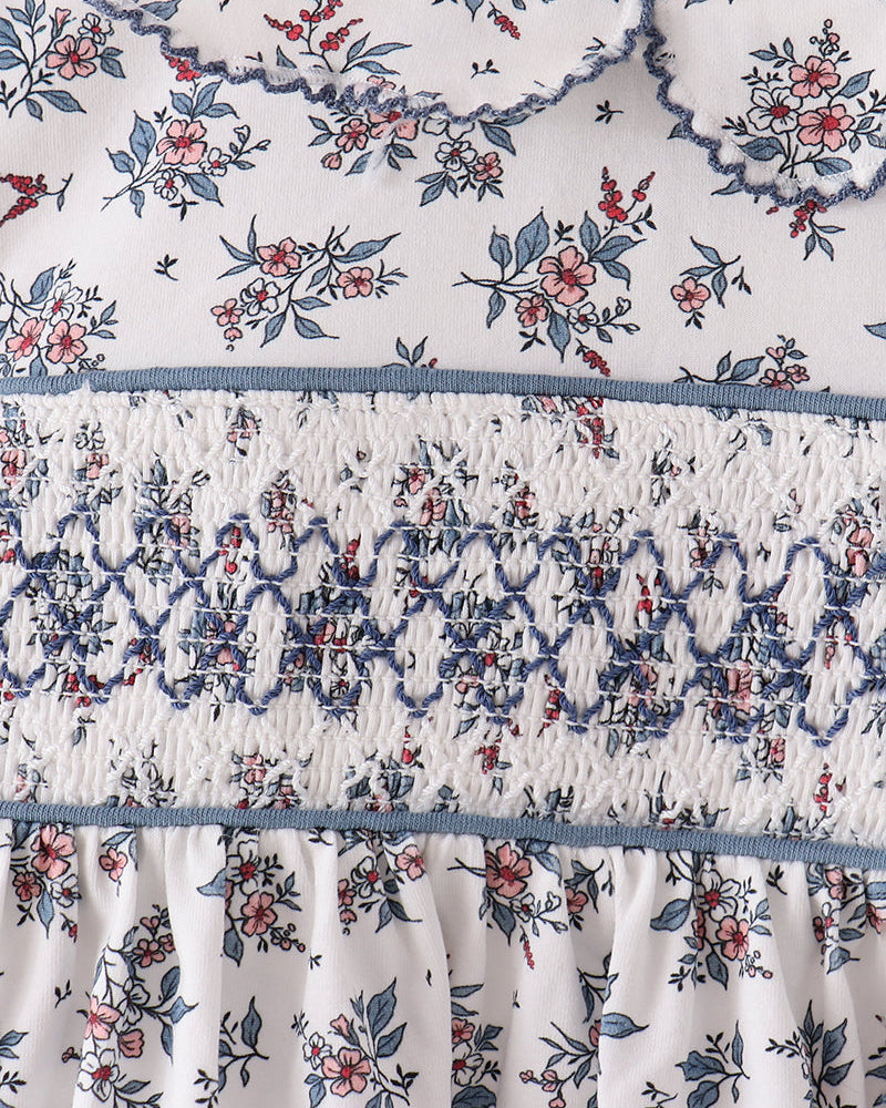 Floral smocked bodice with gathered skirt detail on white base