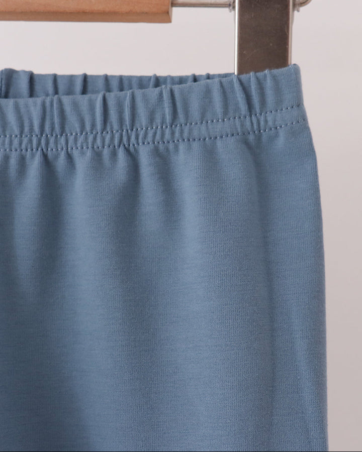 Solid blue pants with elastic waistband and smooth straight-leg fit