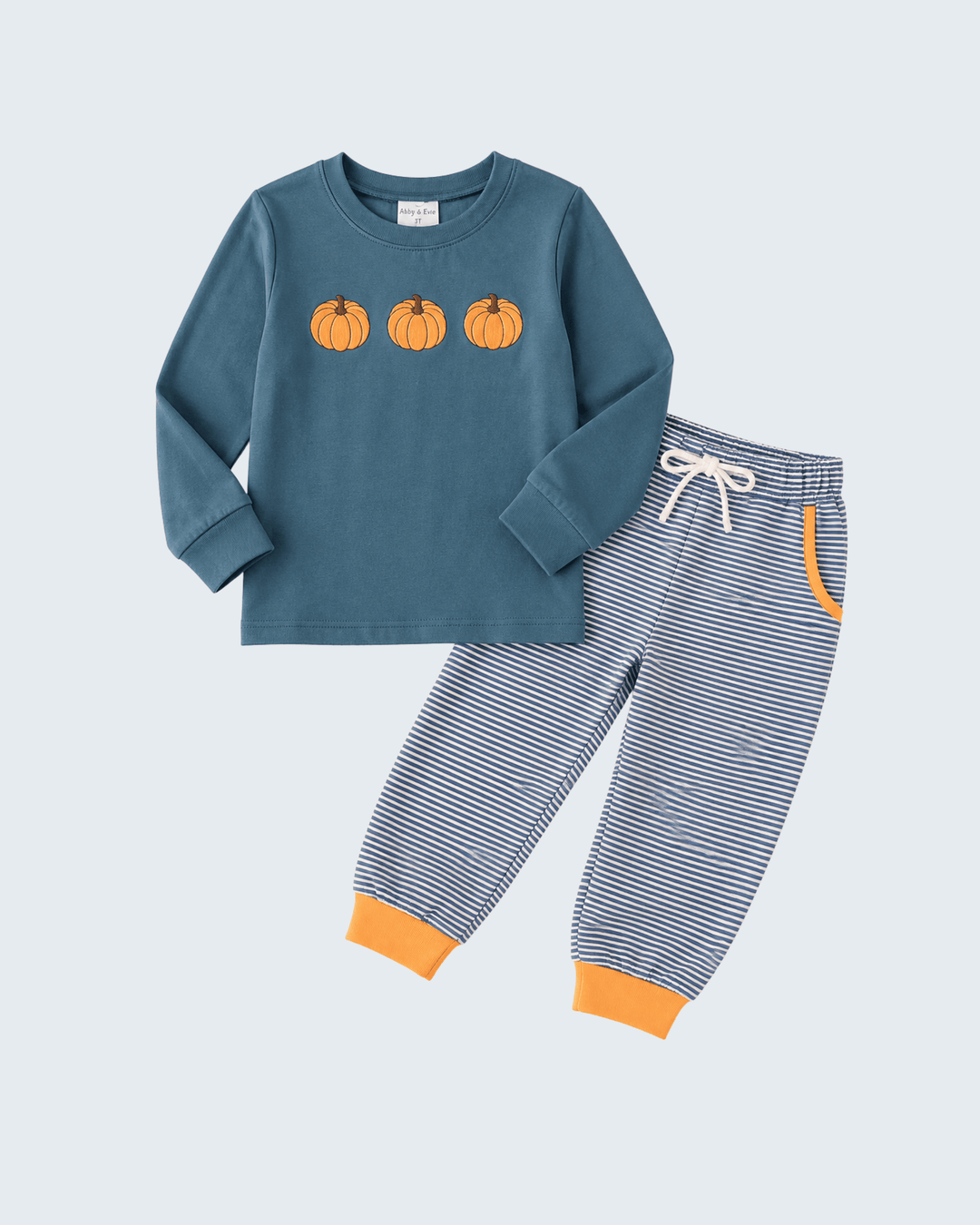 Teal long-sleeve shirt with pumpkin embroidery and blue striped pants with orange cuffs
