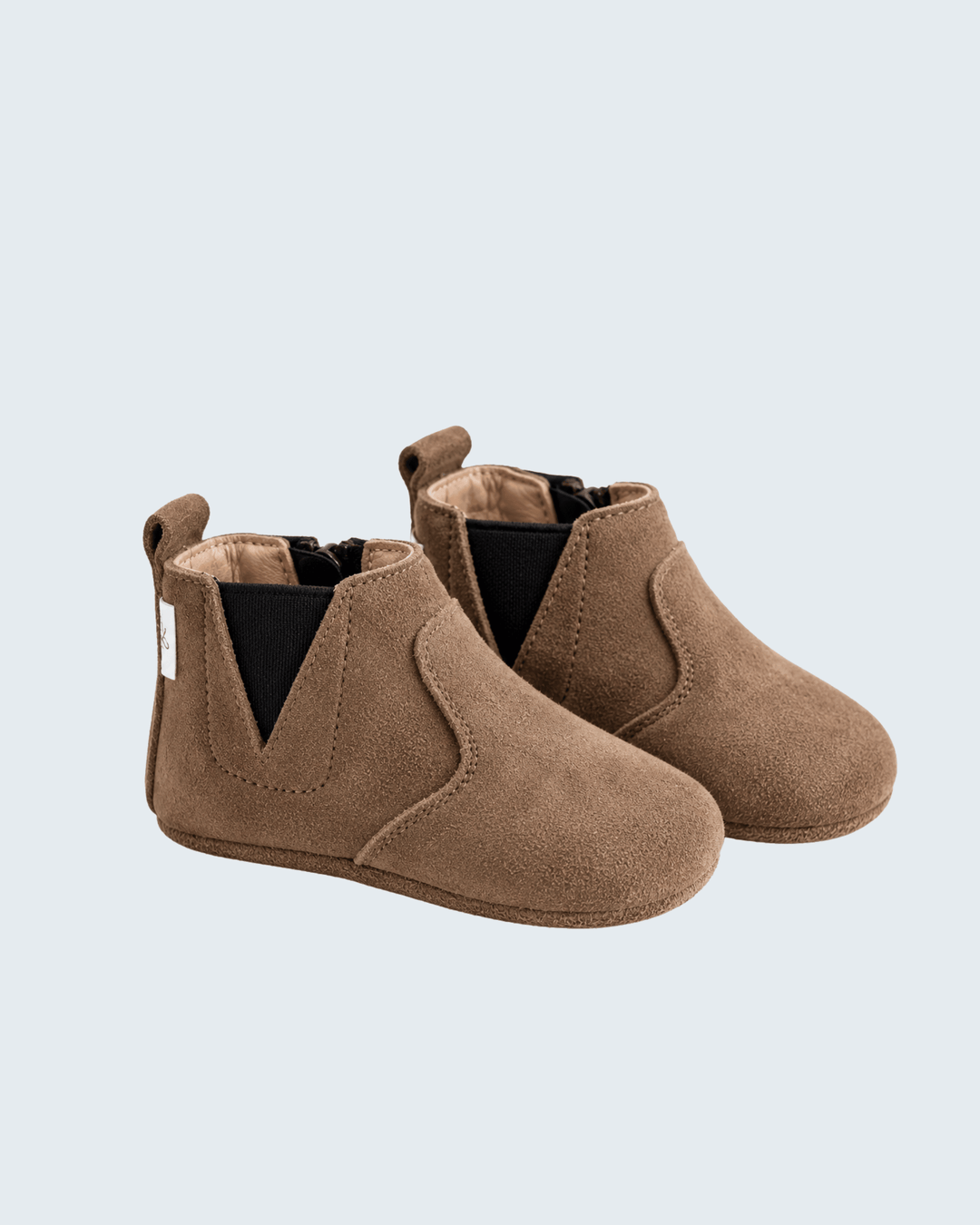 Tan suede chelsea barefoot ankle boots with elastic side gore, pull-on.