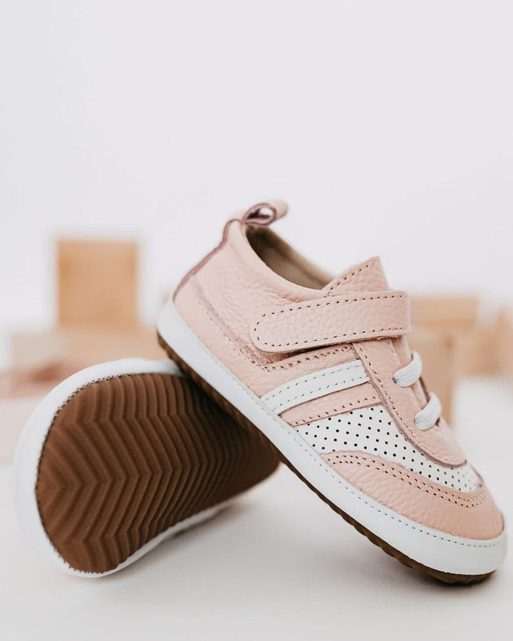 Light pink kids sneakers with hook-and-loop strap and grippy sole