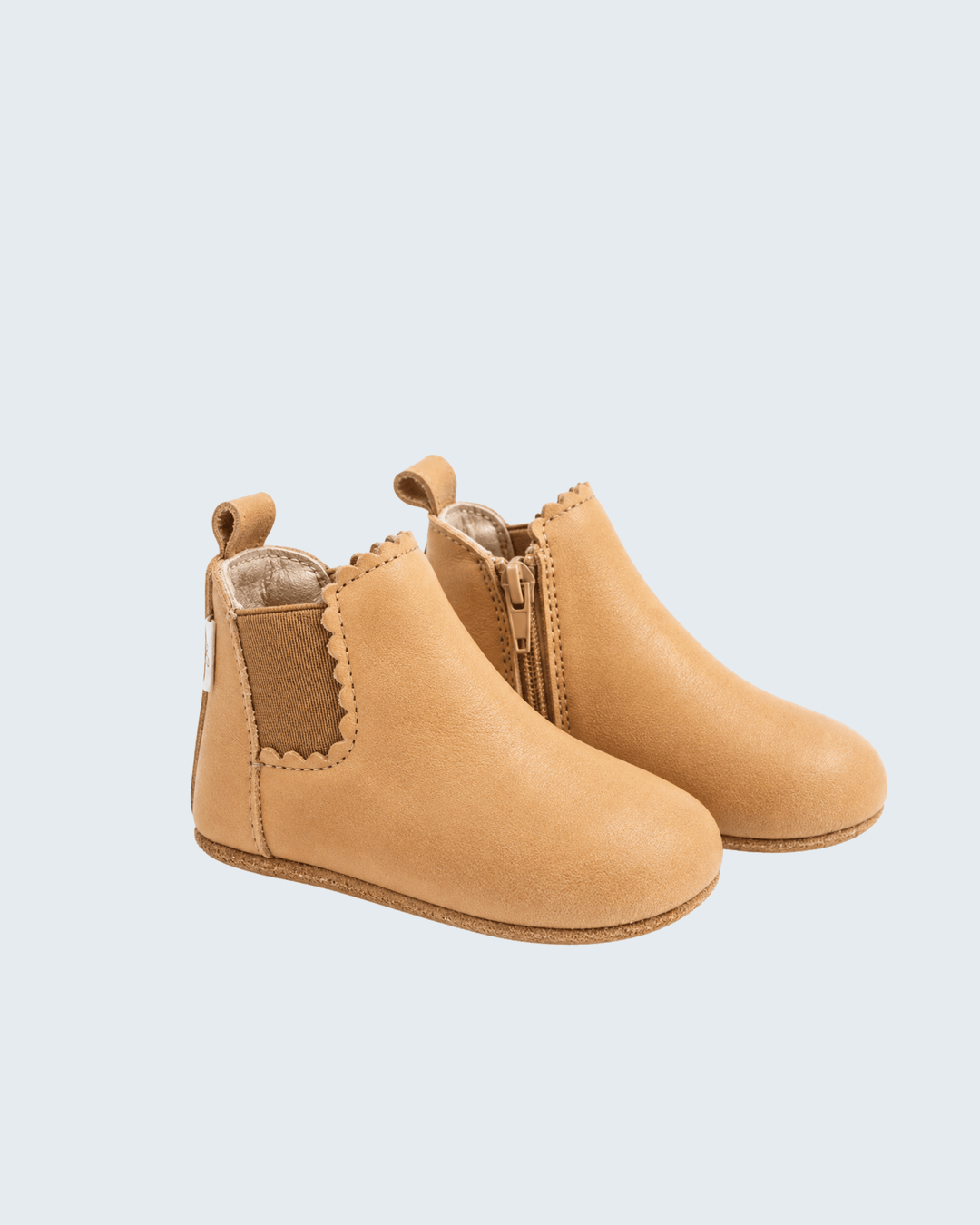 Desert sand suede barefoot ankle boot with side zipper and padded collar