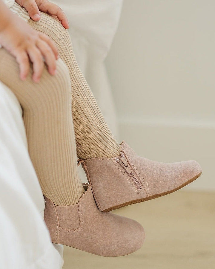 Pink suede pull-on ankle boots with elastic gore and side seam detail