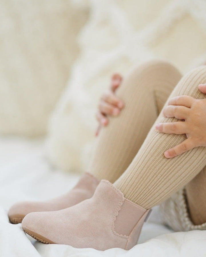Light pink suede ankle boots with elastic side and pull-tab