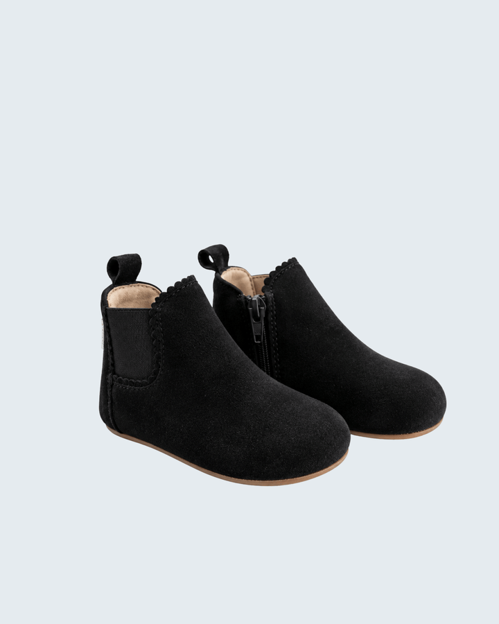 Black suede barefoot ankle boot with side zipper and padded collar
