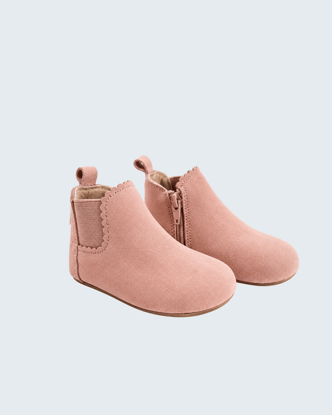 Blush suede barefoot ankle boot with side zipper and padded collar