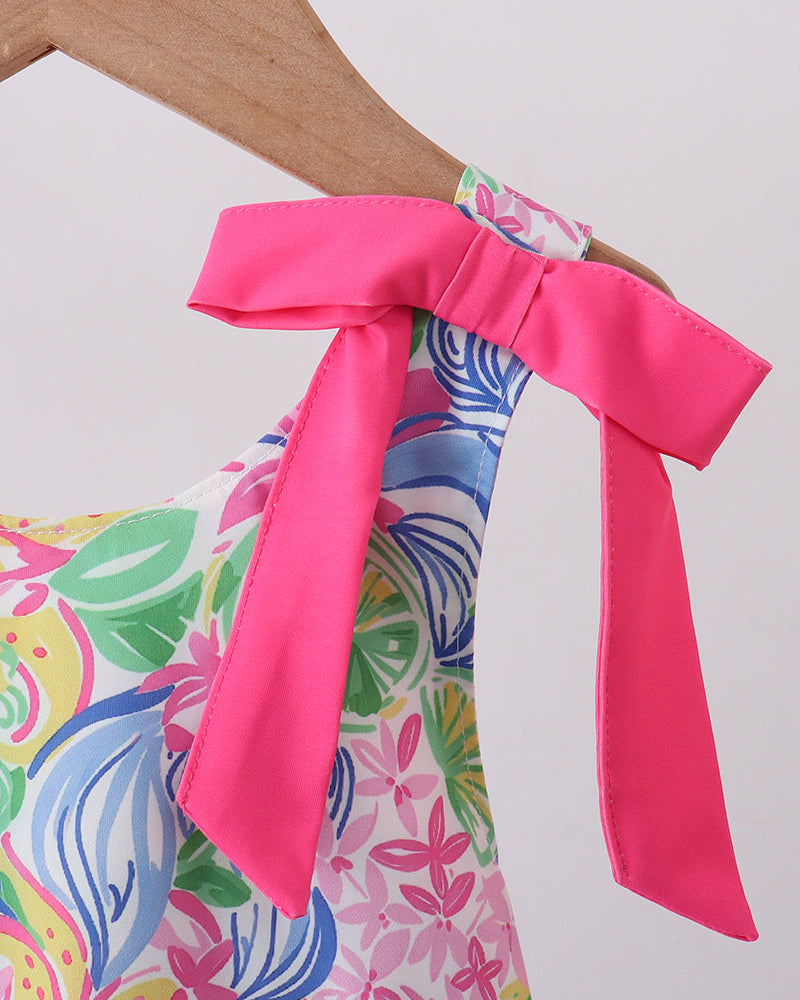 Pink bow on floral swimsuit