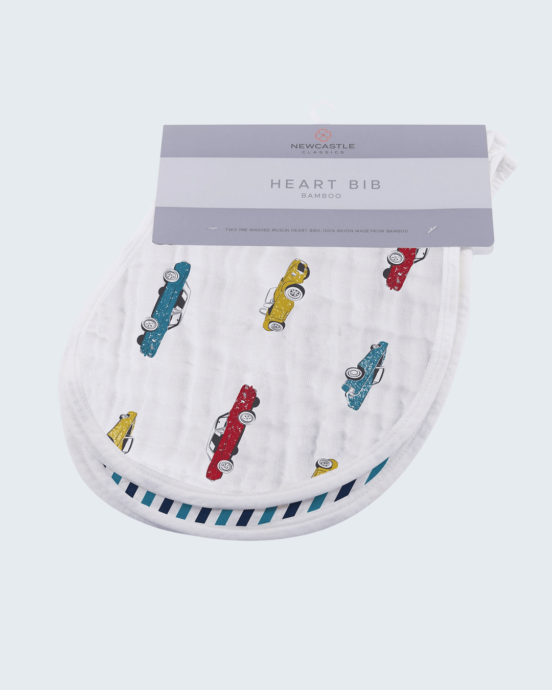 Heart-shaped bib with colorful car patterns on a white background, featuring Newcastle Baby &amp; Kids branding.