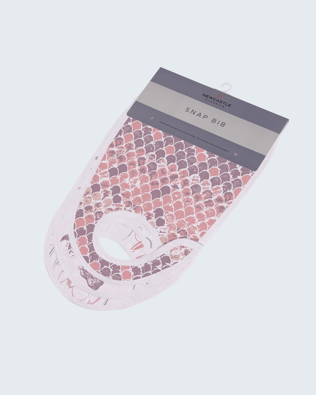 Pink and purple patterned snap bib in packaging on a white background
