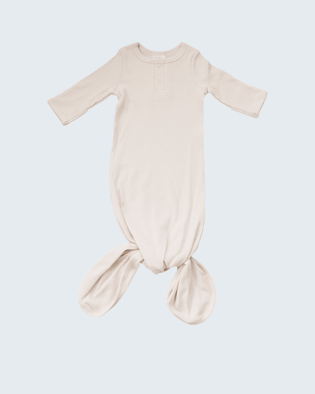 Beige baby wrap on a light blue background