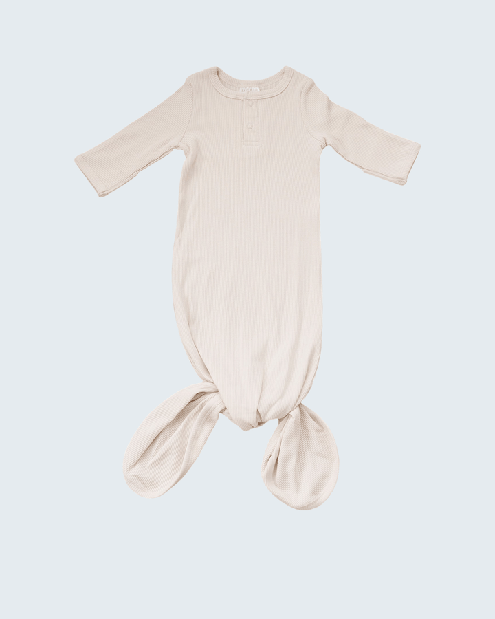Beige baby wrap on a light blue background