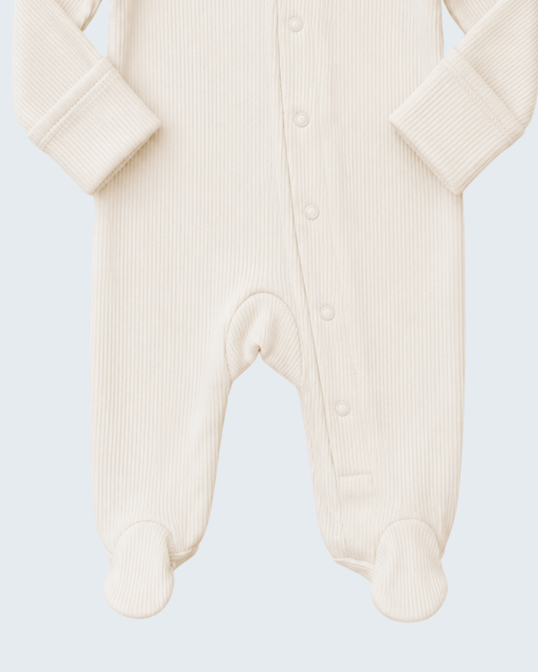 Cream ribbed snap-front baby one-piece, button placket and open foot panels