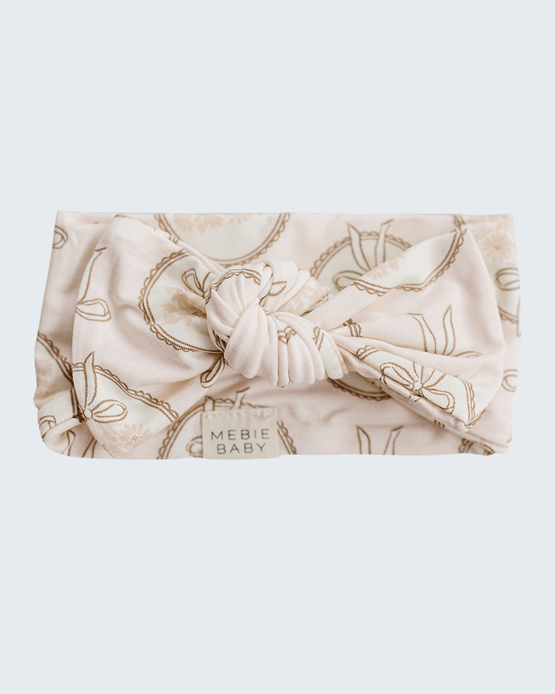 Cream bamboo head wrap with vintage floral print and gathered knot at front