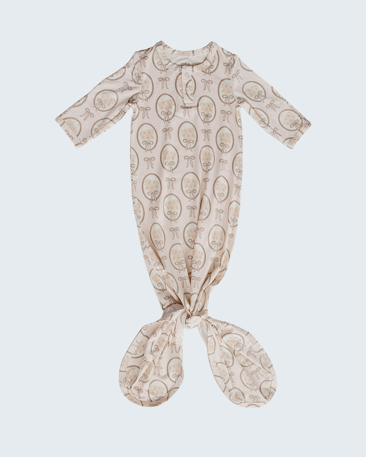 Bamboo knot gown in light tan with bow and oval print, long sleeves, tied waist