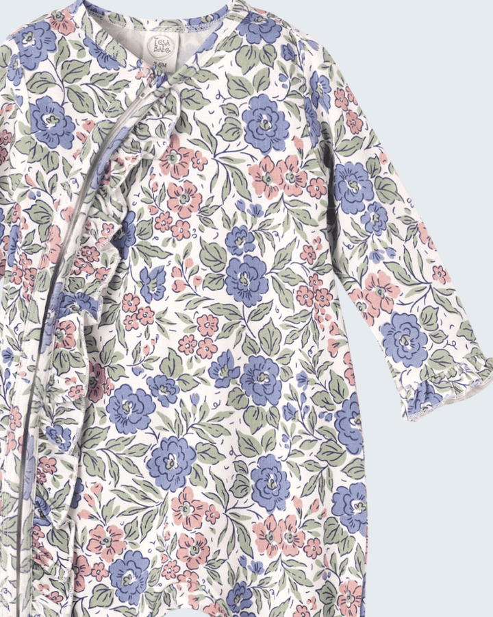 Close-up floral romper with front zipper placket and V-neck collar