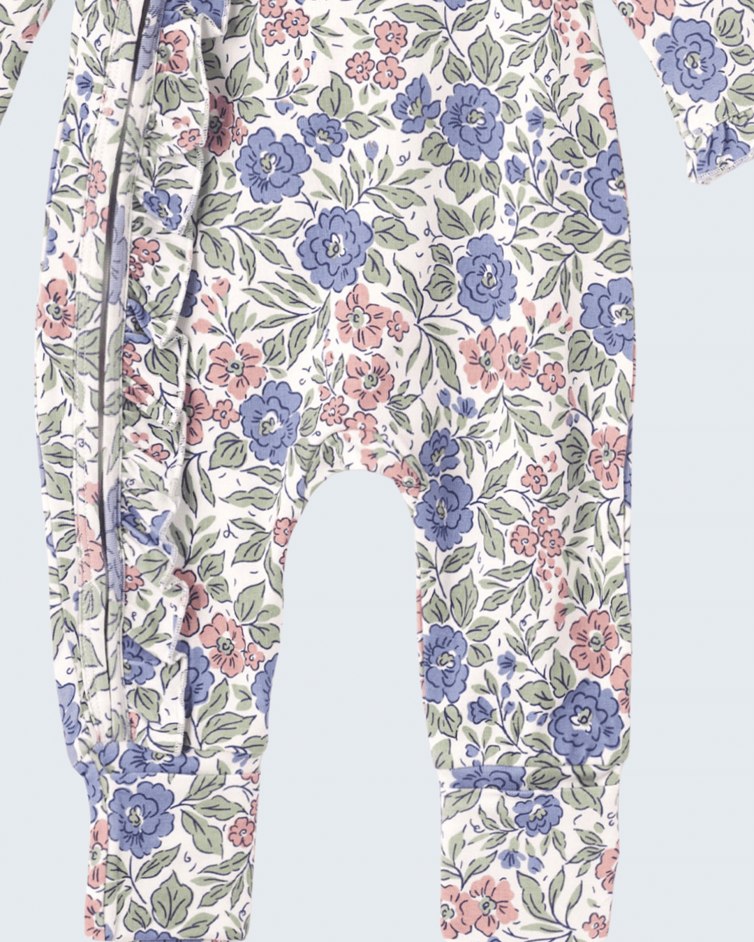 Pastel floral long-sleeve romper with front zipper and roomy pant legs