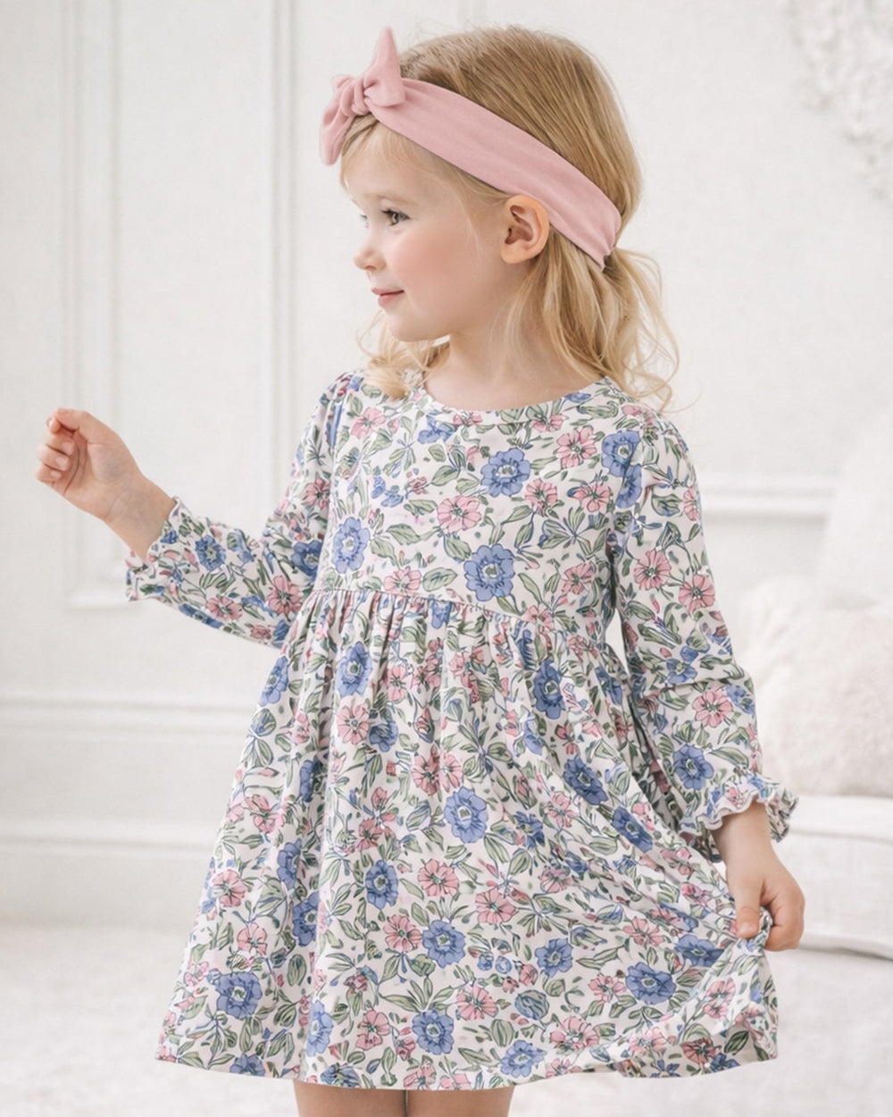 Floral long-sleeve dress with gathered bodice and pastel blue, pink, green print