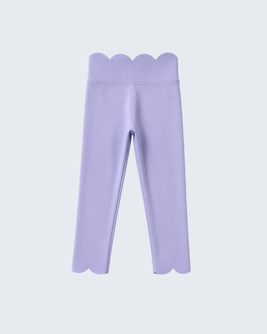 Lavender leggings with scalloped edges on a light gray background