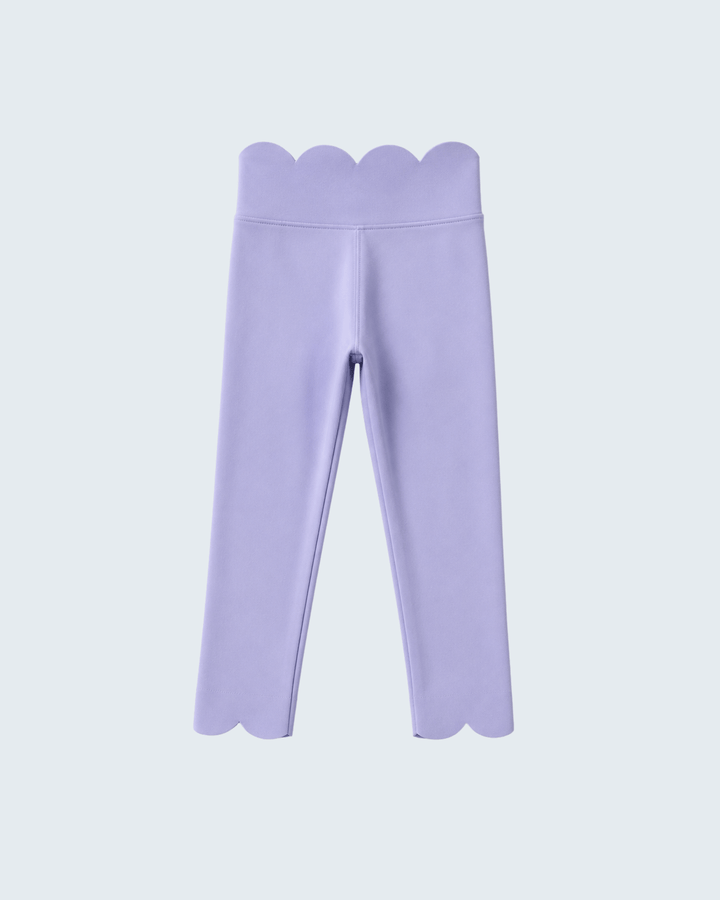 Lavender leggings with scalloped edges on a light gray background