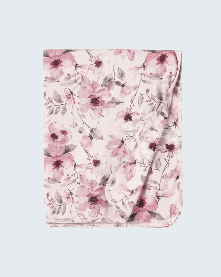 Bamboo baby blanket with watercolor floral print, pink flowers and soft border