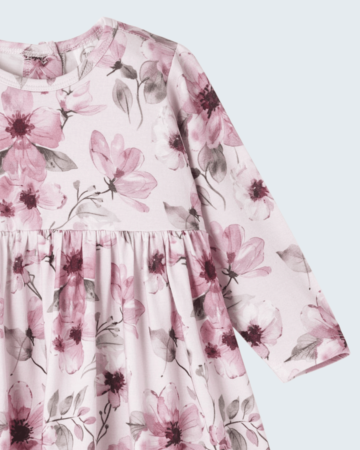 Floral bamboo dress close-up: long sleeves and gathered yoke, round neck