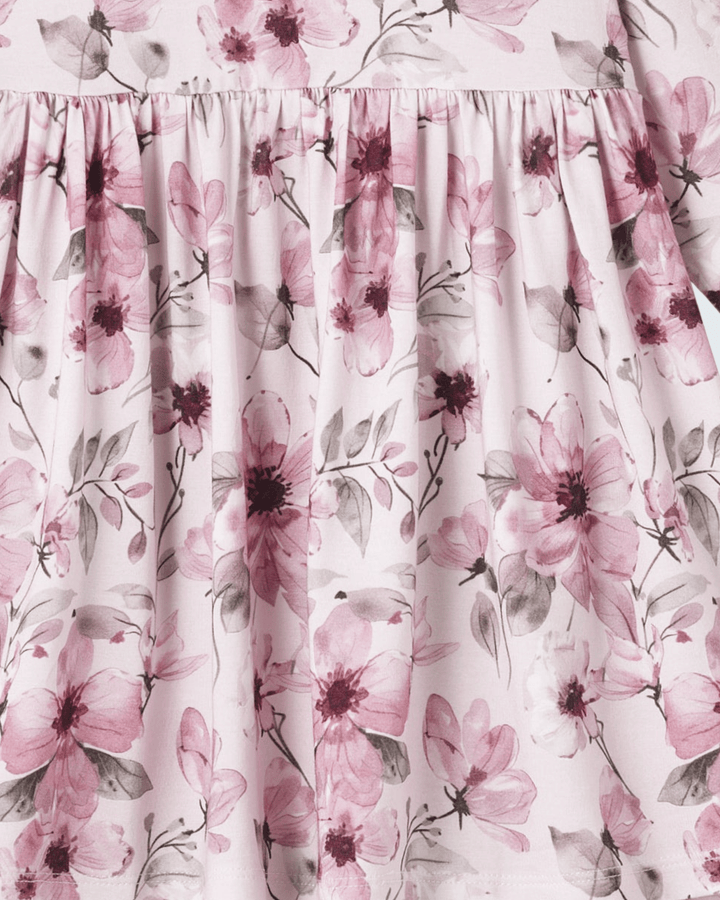Bamboo dress detail: gathered yoke and flowing skirt with pink floral print