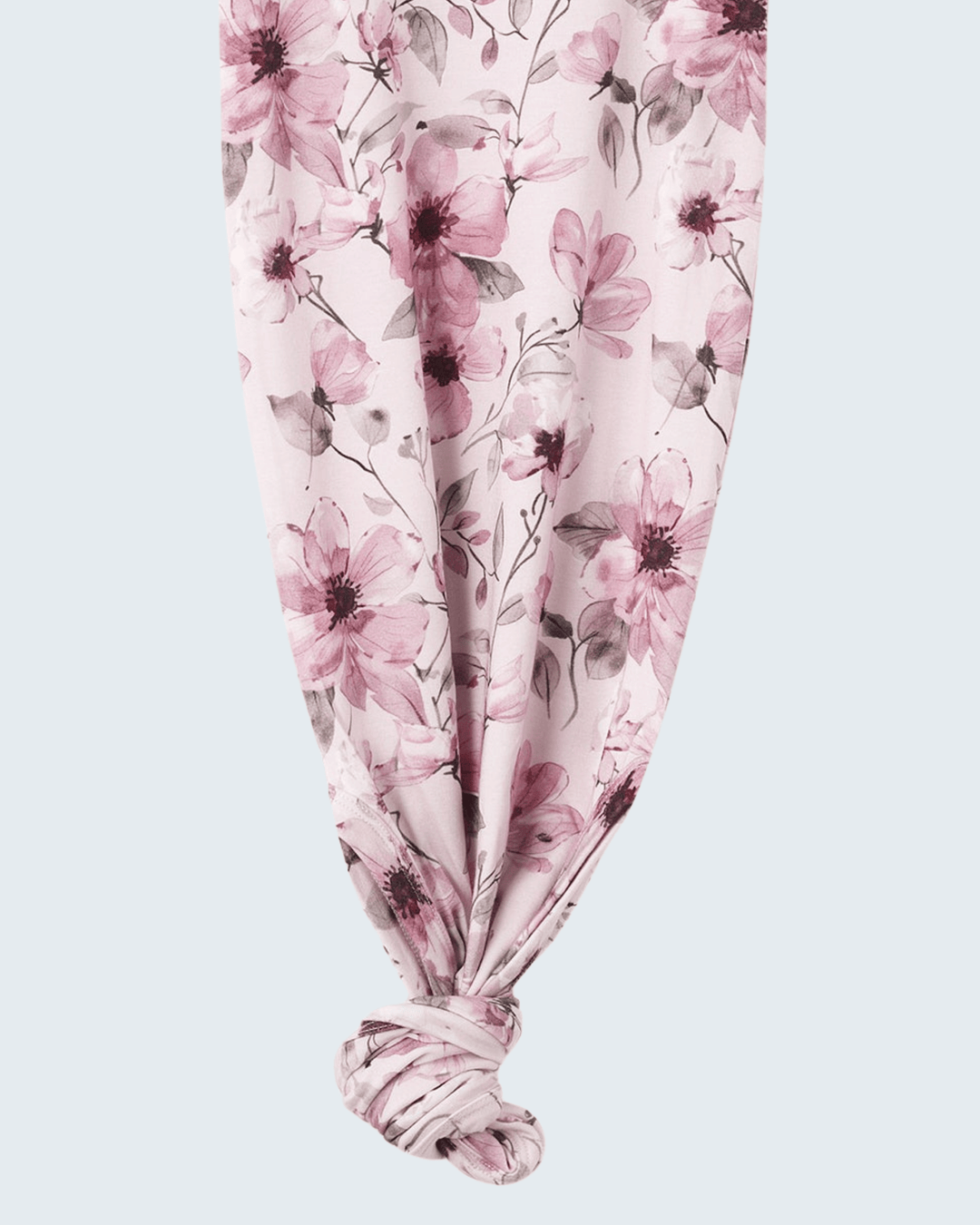 Pink watercolor floral knot gown with gathered knotted hem