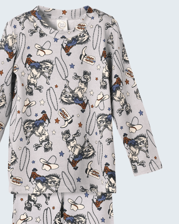 Long-sleeve bamboo pajama top in white with rodeo cowboy and saddle prints