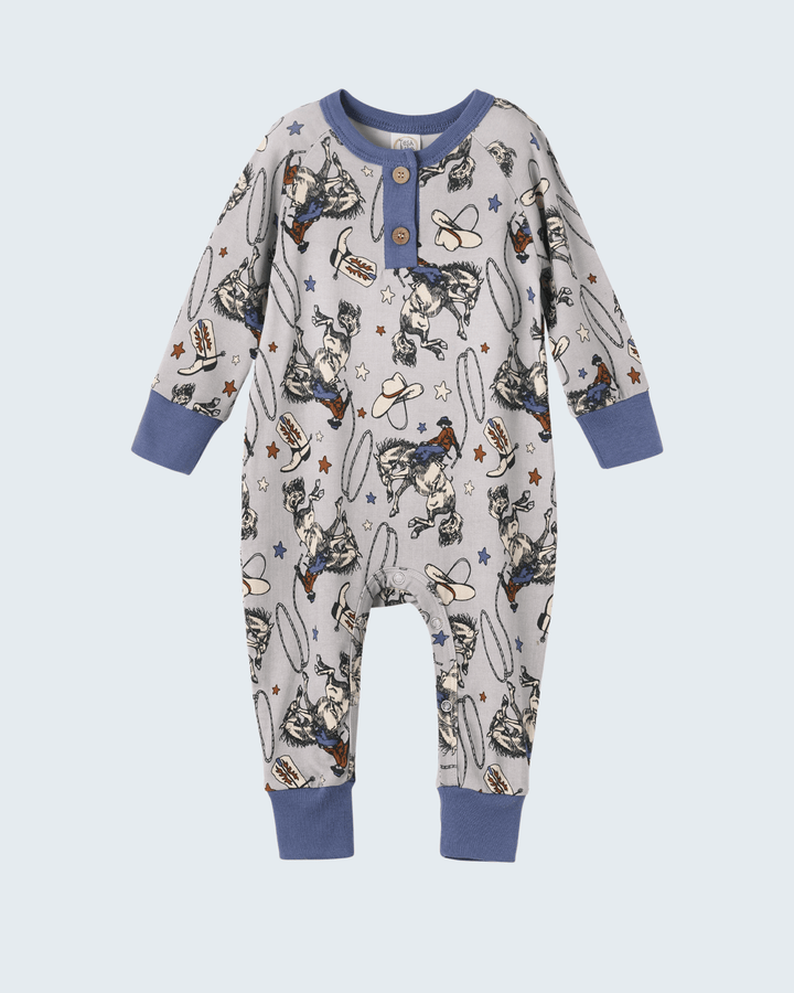 Cowboy graphic bamboo romper with navy henley placket, long sleeves, and ribbed cuffs