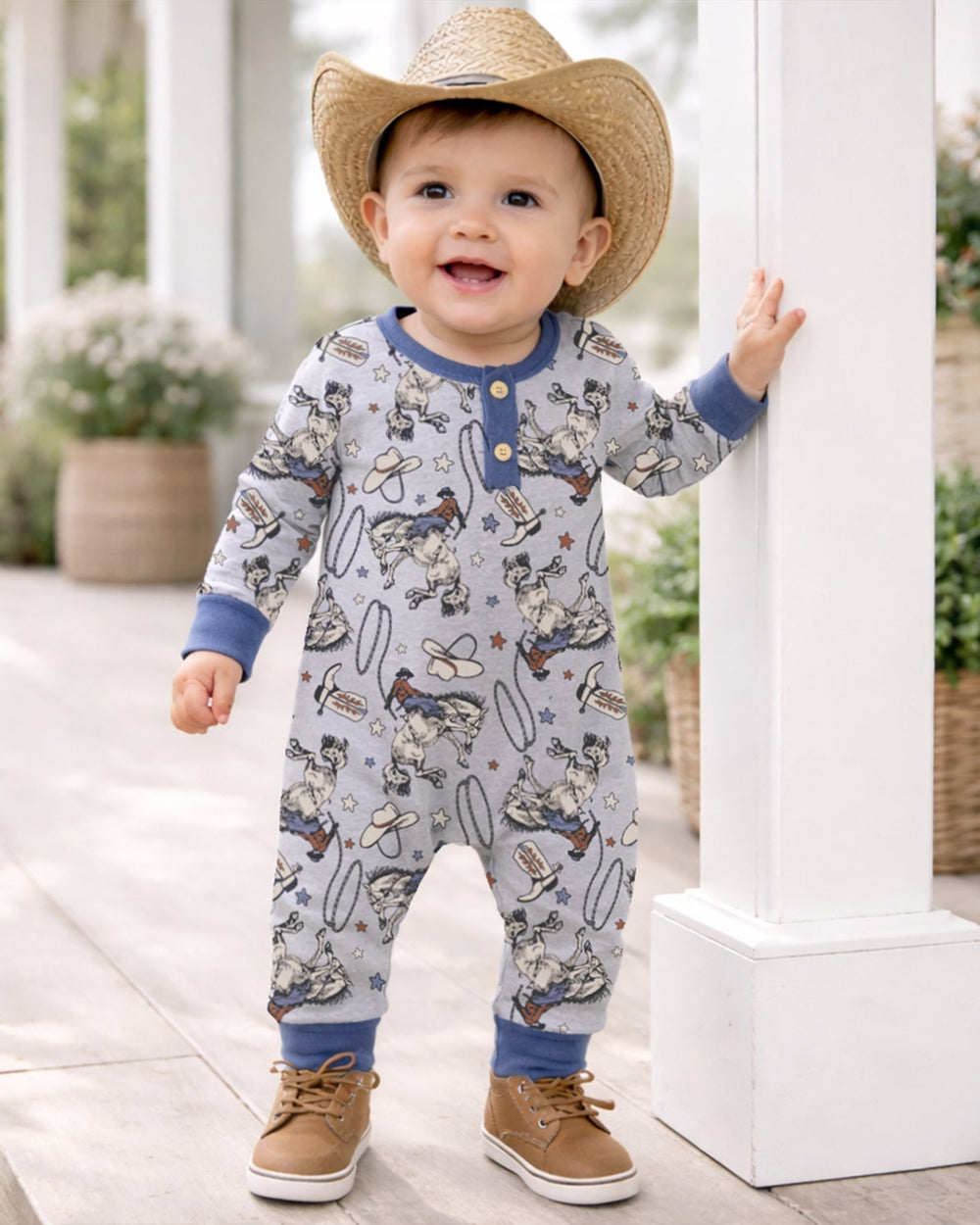 Baby cowboy henley romper, light blue with western animal print and blue cuffs
