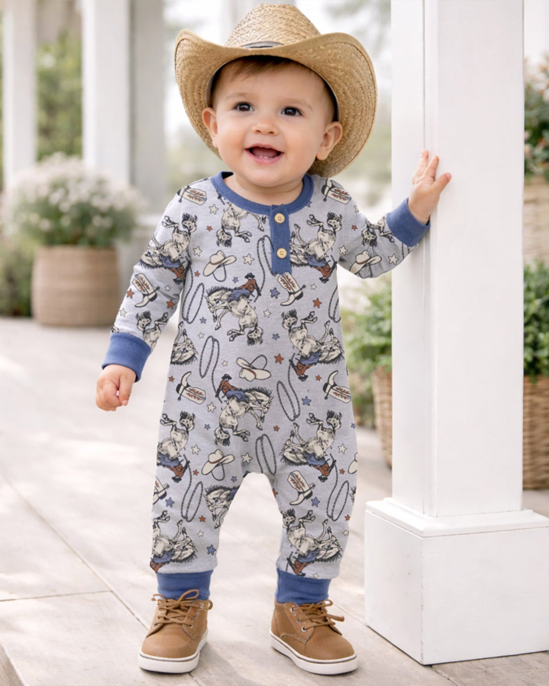 Baby cowboy henley romper, light blue with western animal print and blue cuffs