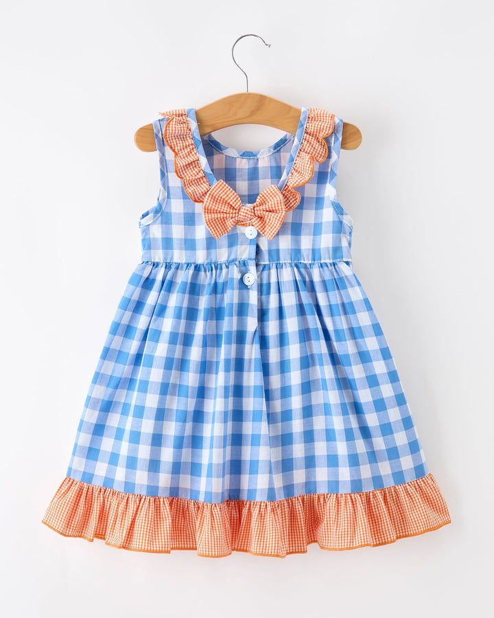 Blue checkered girls dress with orange bow