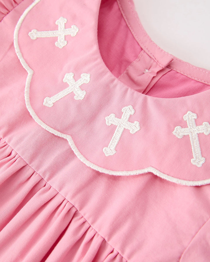 Girls pink dress with scalloped white-trim collar and small white cross embroidery