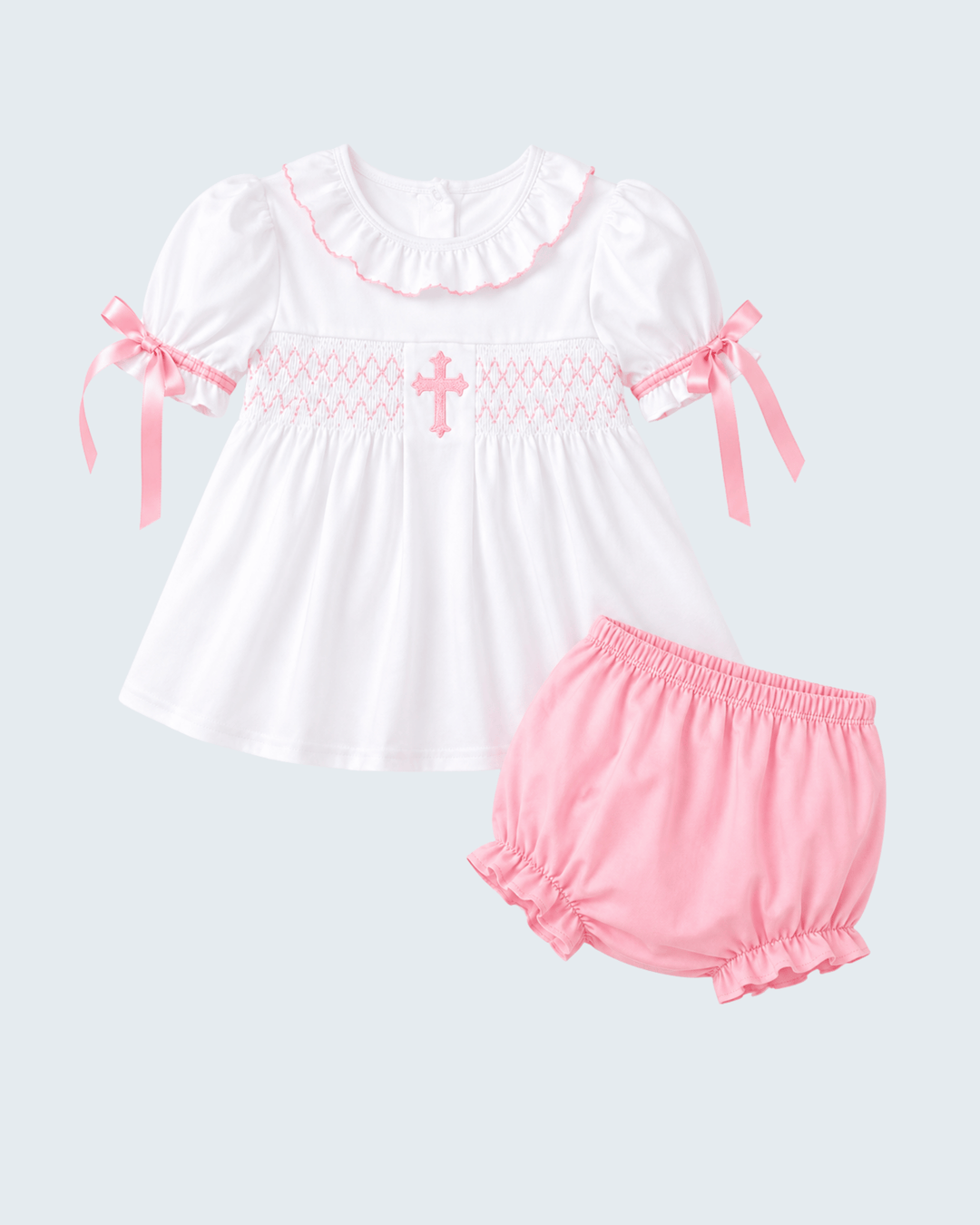 White smocked ruffle bloomer set with pink cross embroidery and matching pink bloomers