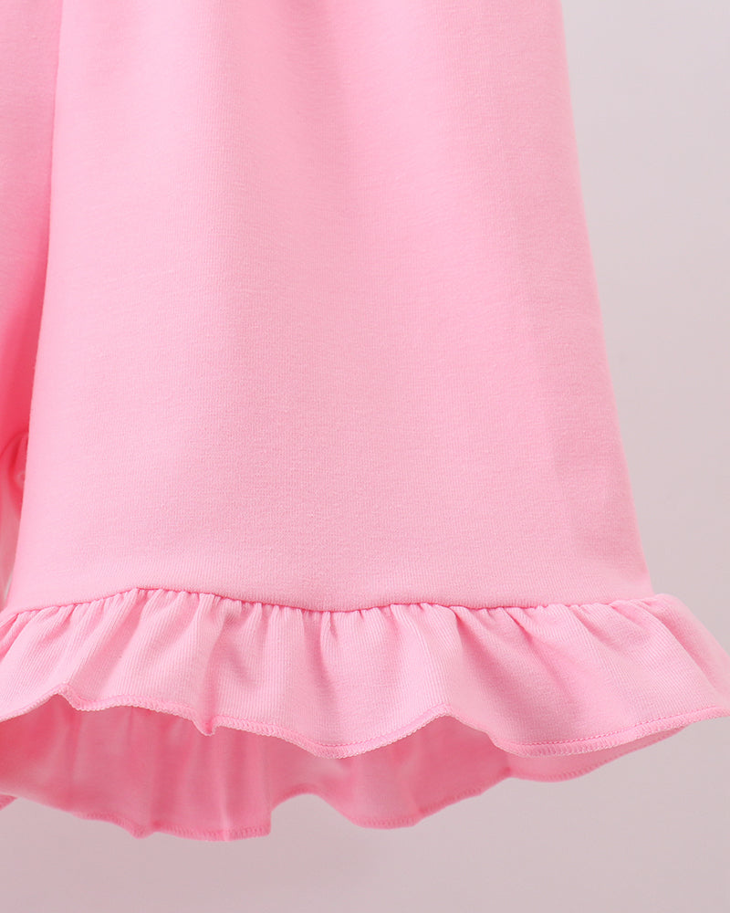Pink ruffle hem top with gathered finish