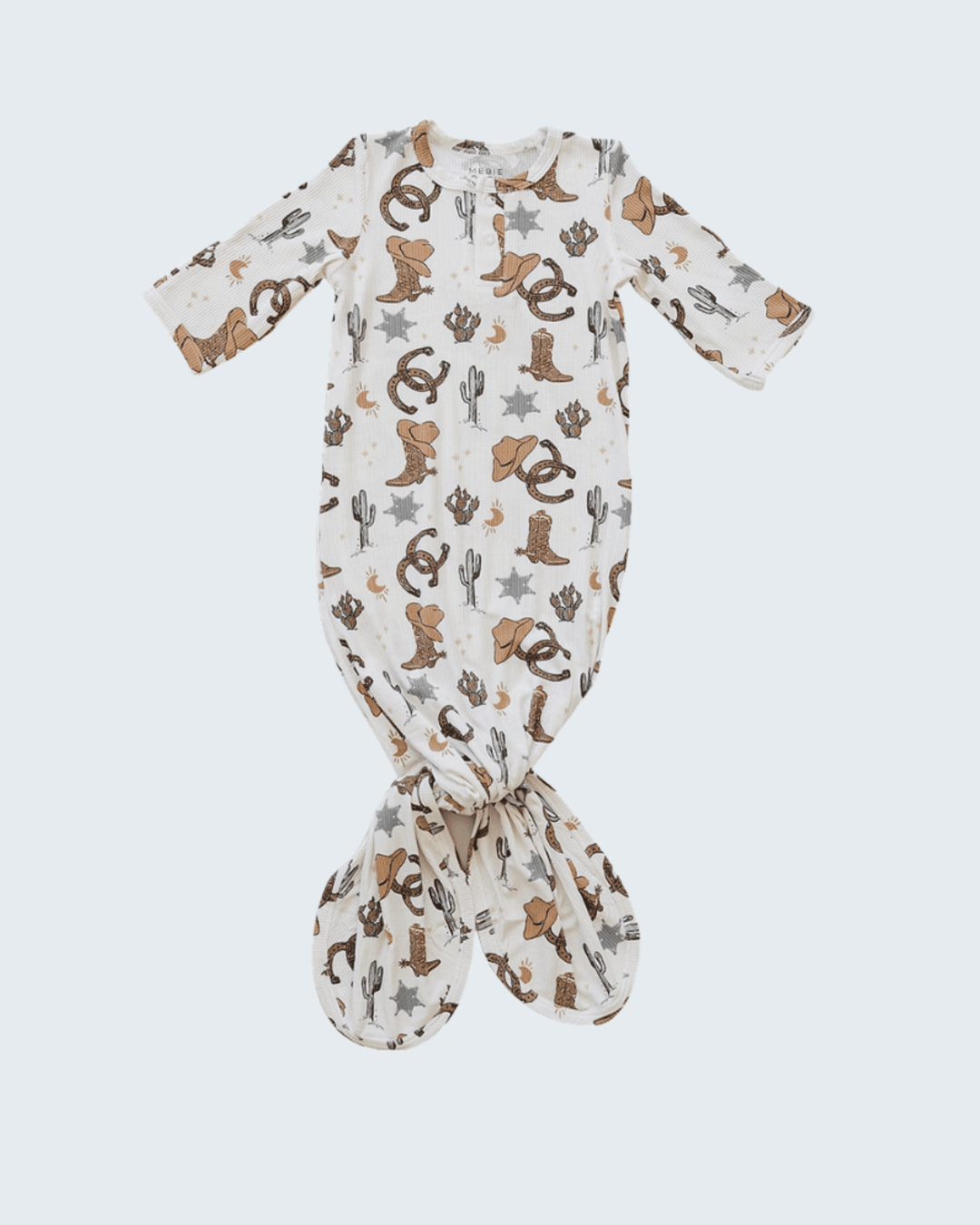 Baby onesie with cowboy pattern on a white background