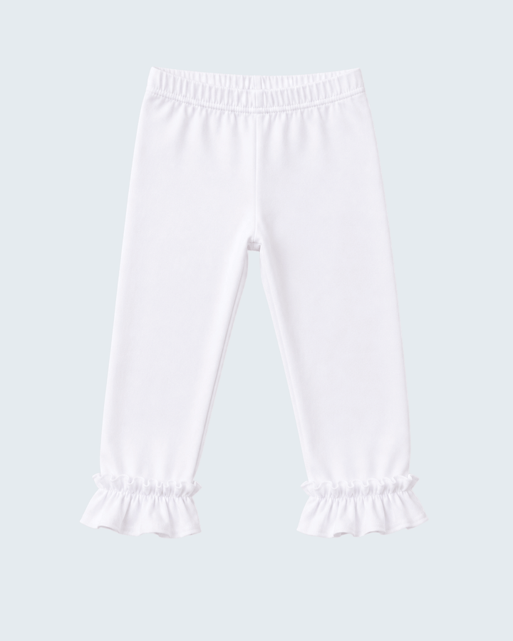 White ruffle hem leggings with gathered cuffs and relaxed straight legs