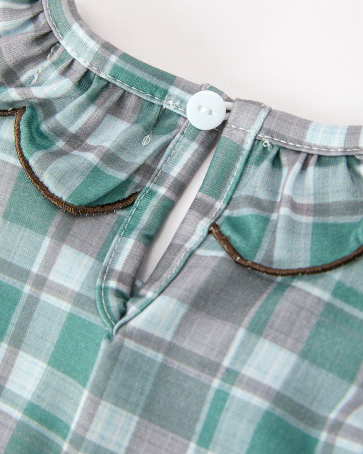Girls teal and gray plaid dress with buttoned neckline and gathered puff sleeves