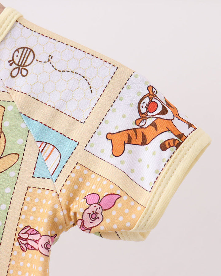 Yellow baby romper sleeve cuff with patchwork cartoon print and side seam stitching