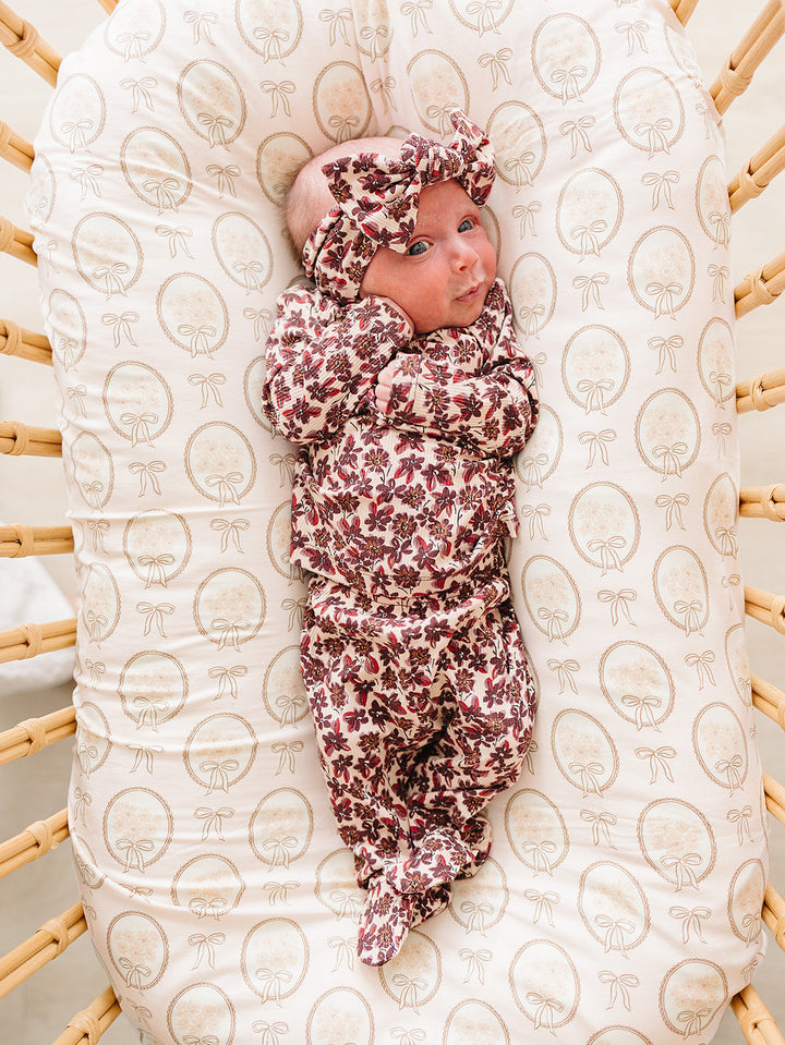 Baby floral head wrap with twisted knot, cream with dark red blossoms and ribbing